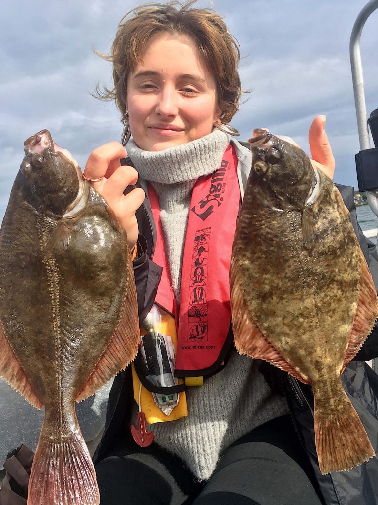 Fladfisk på en hop om bord tur