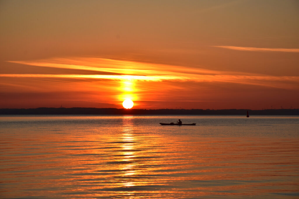 Solnedgang med kajak